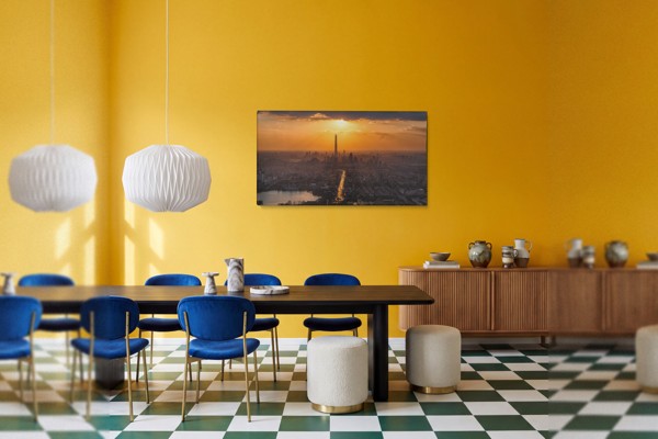 Sunrise Above the City Canvas Print - on the wall in a room interior