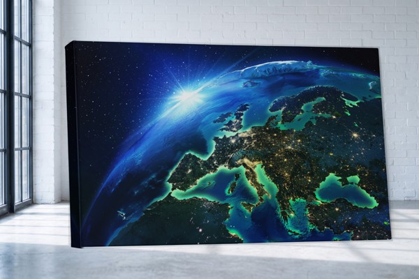 Erde aus dem Weltall Leinwanddruck - Blauer Planet - an der Wand in einem Raum